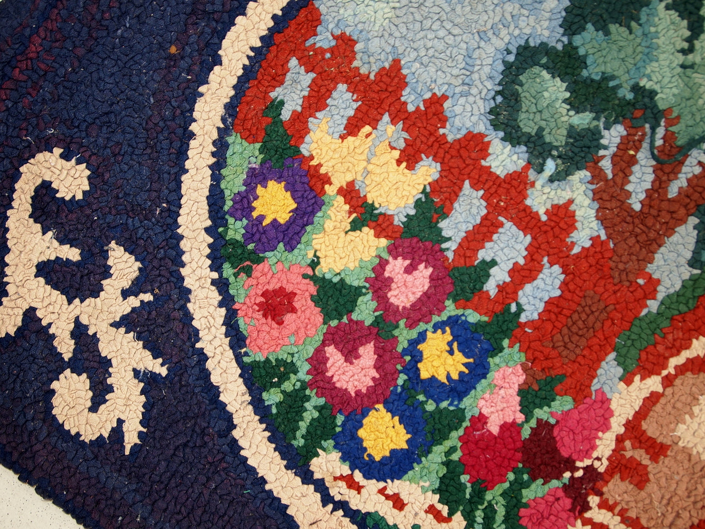 Close-up of the purple elements in the rug's design.