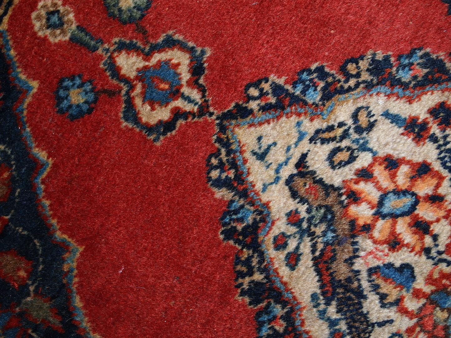 Antique Tabriz double mat in original good condition, one of the rugs has some low pile. The design is traditional with decorative birds in the center.