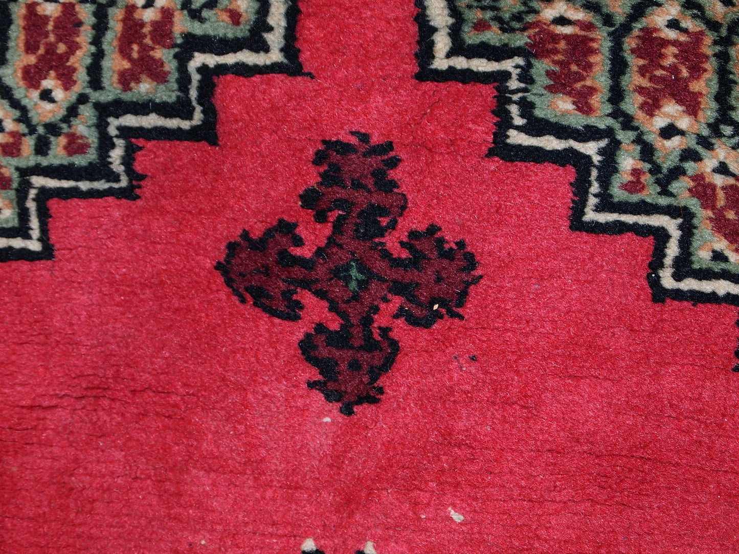 Vintage Algerian Berber rug in original good condition. This rug is from the end of 20th century made in pink wool.