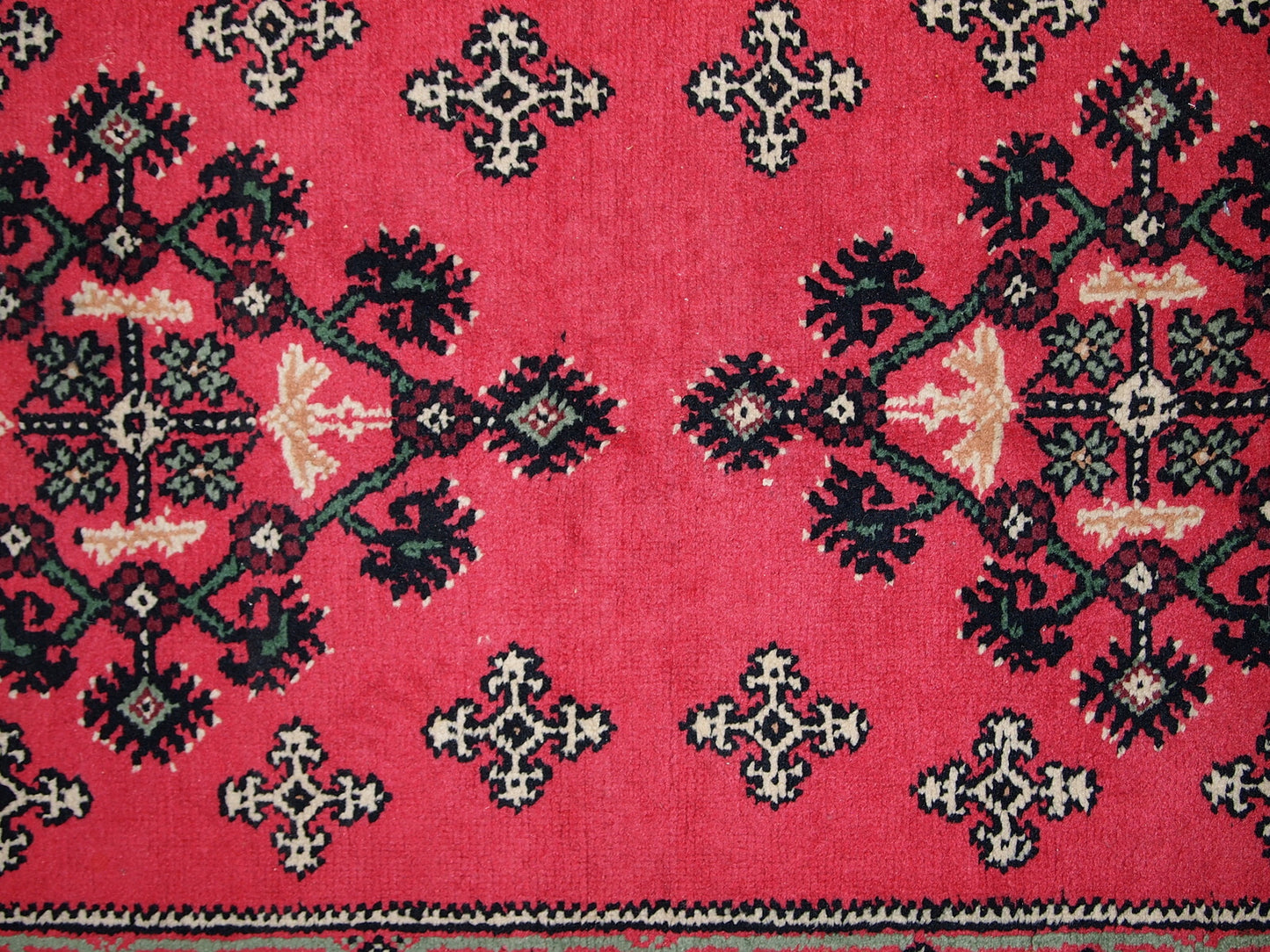 Vintage Algerian Berber rug in original good condition. This rug is from the end of 20th century made in pink wool.