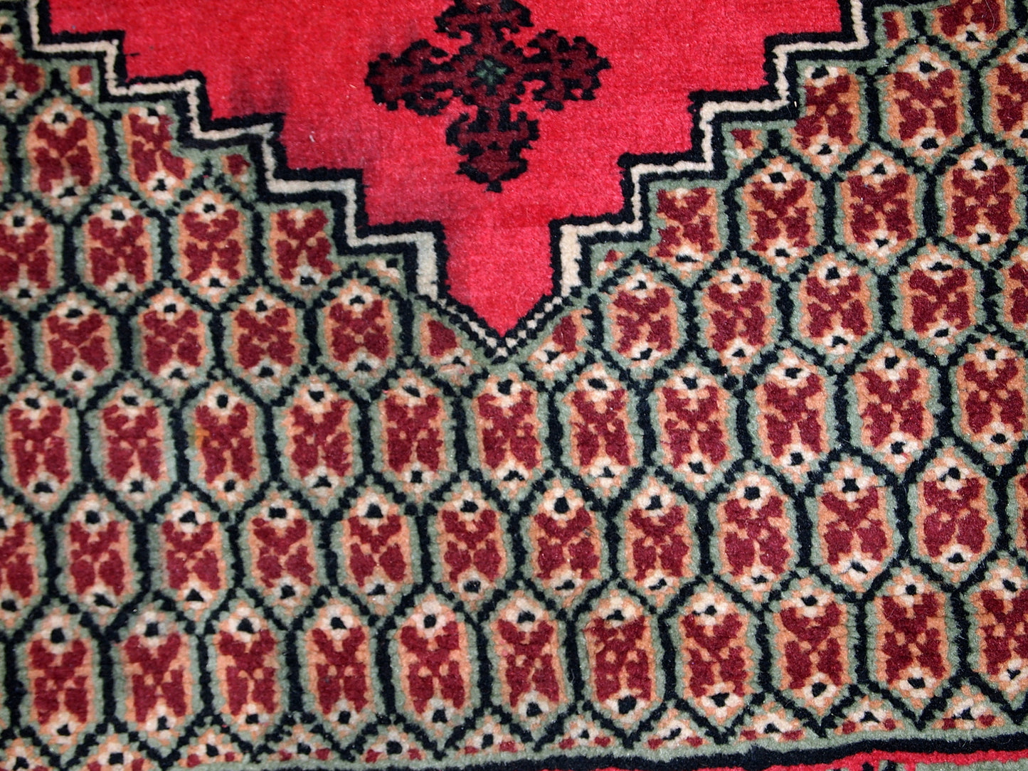 Vintage Algerian Berber rug in original good condition. This rug is from the end of 20th century made in pink wool.
