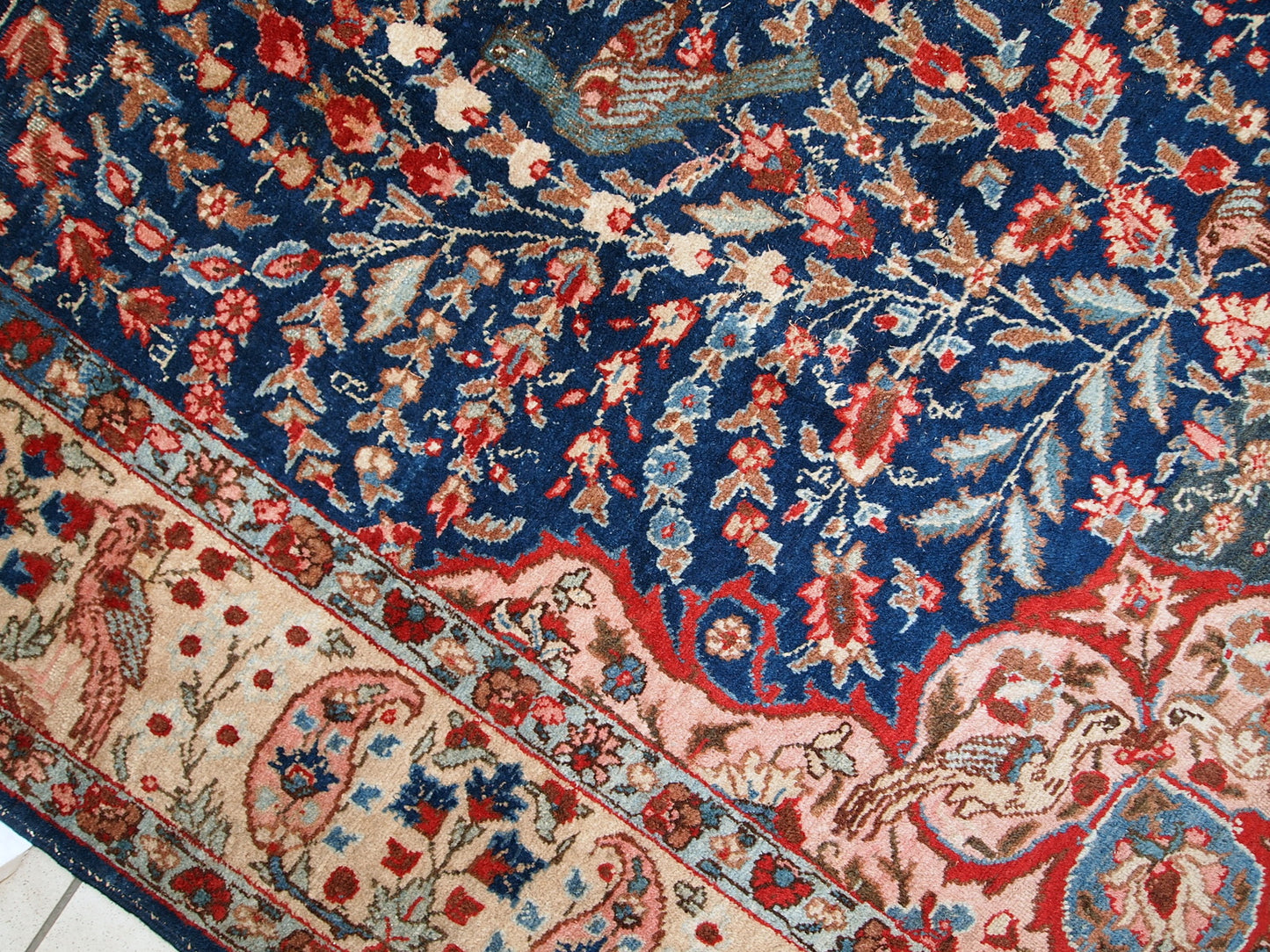 Antique Tabriz rug in original good condition. This beautiful masterpiece made in the beginning of 20th century in navy blue and pink shades.