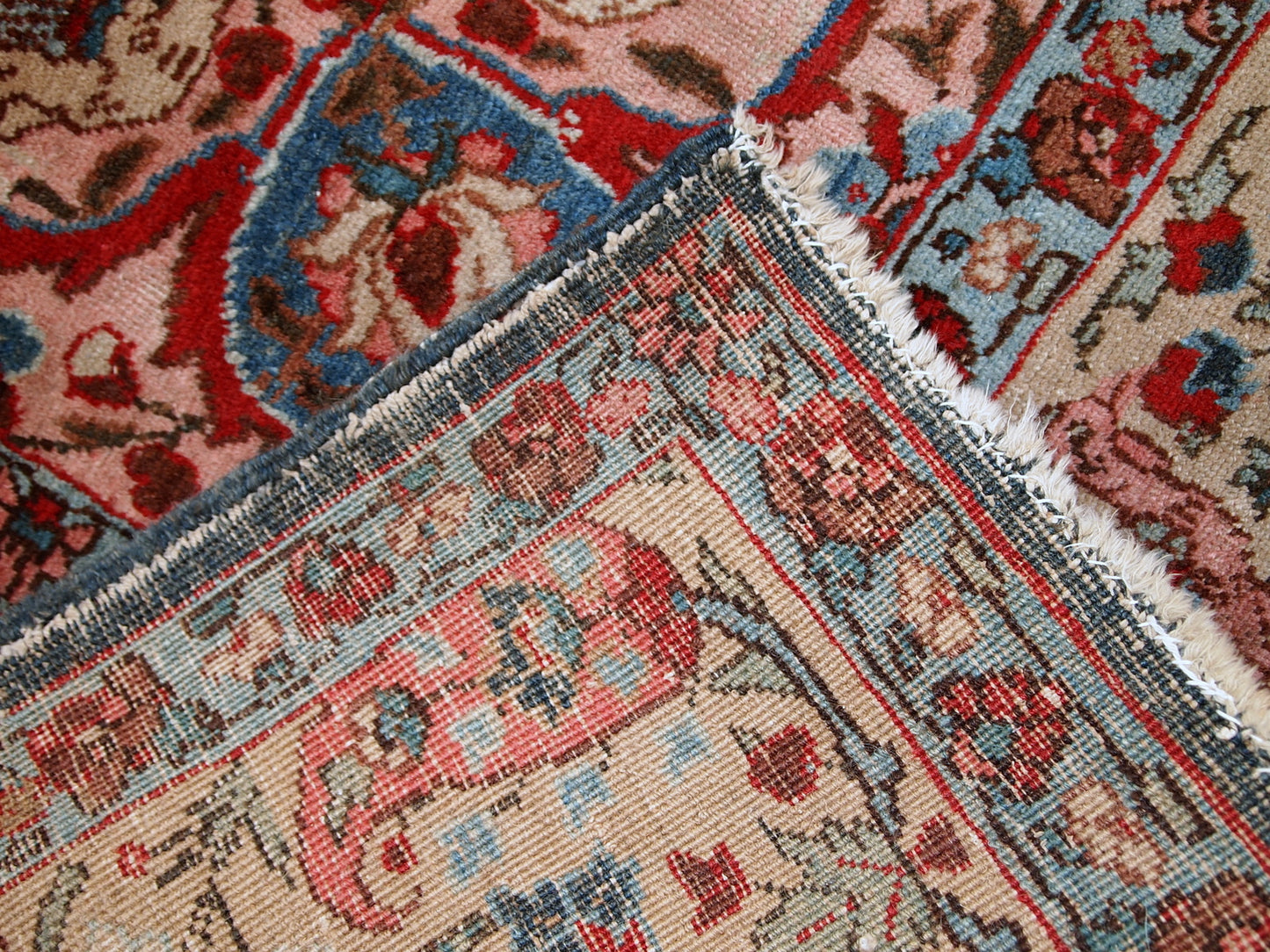 Antique Tabriz rug in original good condition. This beautiful masterpiece made in the beginning of 20th century in navy blue and pink shades.