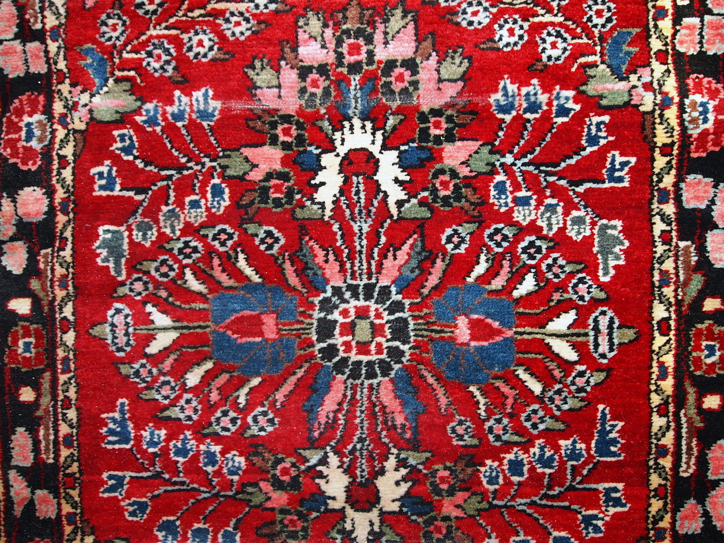 Hand made antique Persian Lilihan runner in original condition, it has several areas with low pile. This runner is heavy, it has been made in the beginning of 20th century.