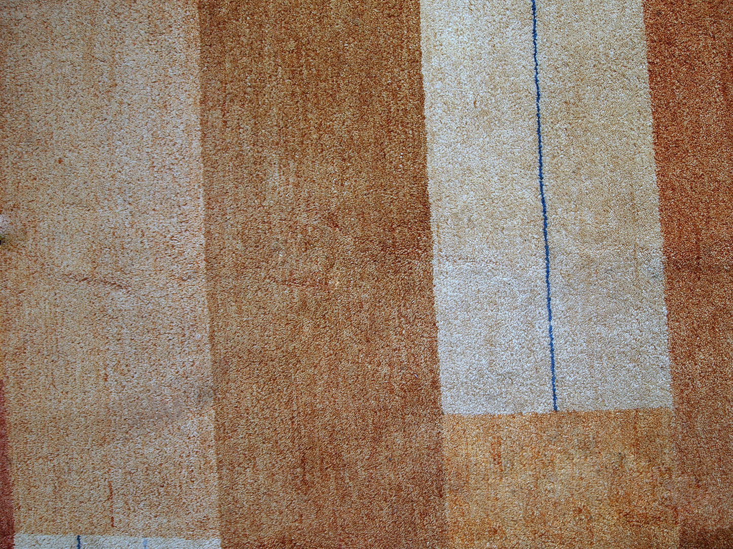 Vintage Persian Gabbeh rug in original good condition. It is in brownish, beige and red wool with geometric design, made in the end of 20th century.