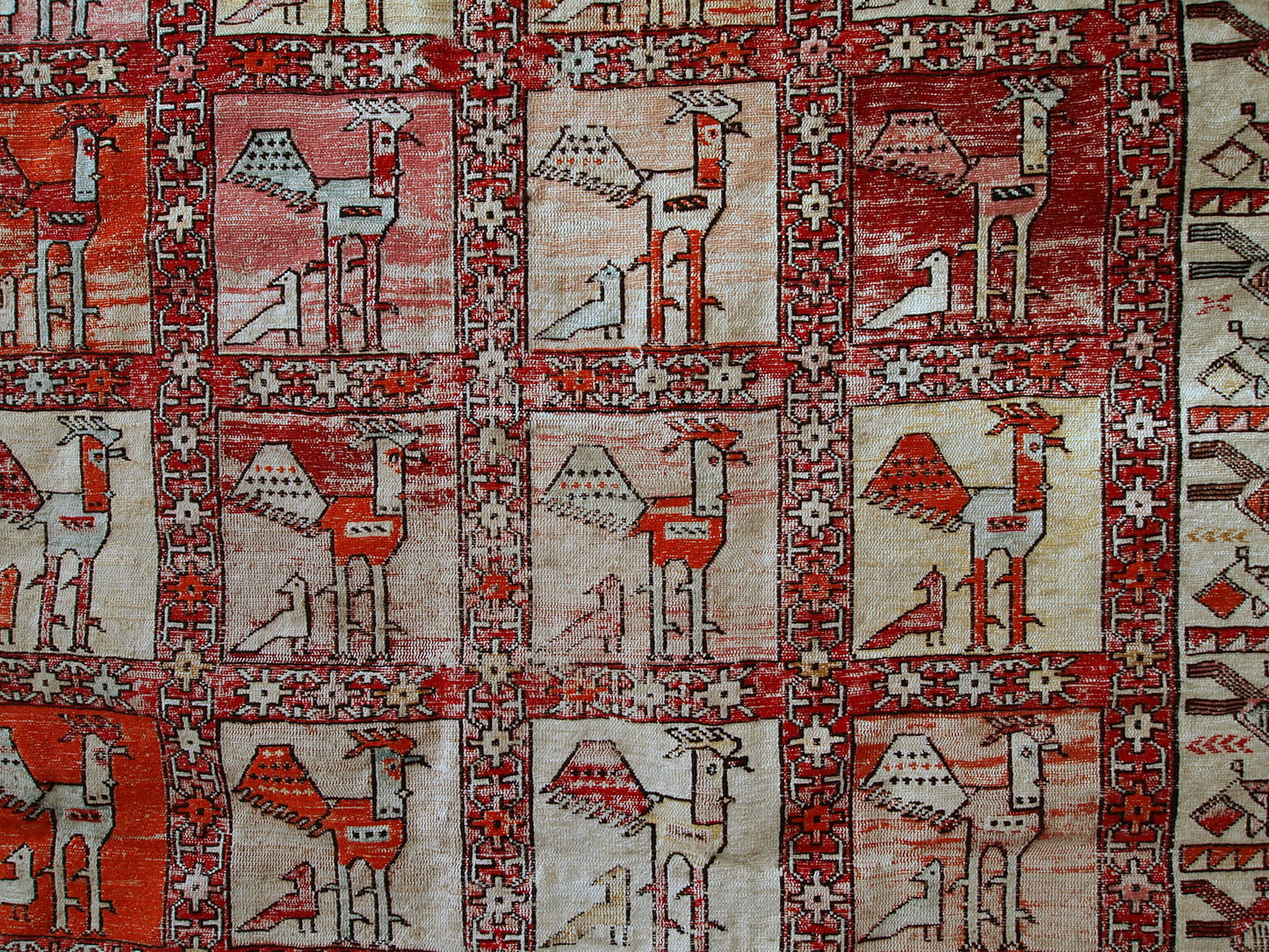 Vintage Persian flat-weave in original good condition. This kilim was made out of artificial silk on cotton base. It has very unusual design of repeated roosters in different shades. It has been made with an accent of warn effect, but it is actually in original good condition.