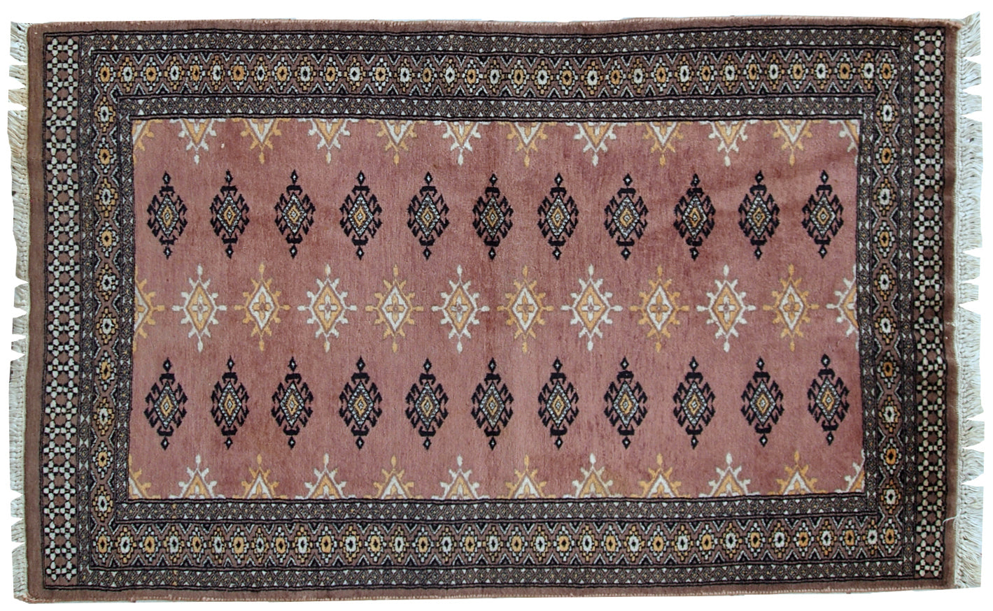 Handmade vintage Uzbek Bukhara rug in original good condition. The rug made in soft wool of peach shade.