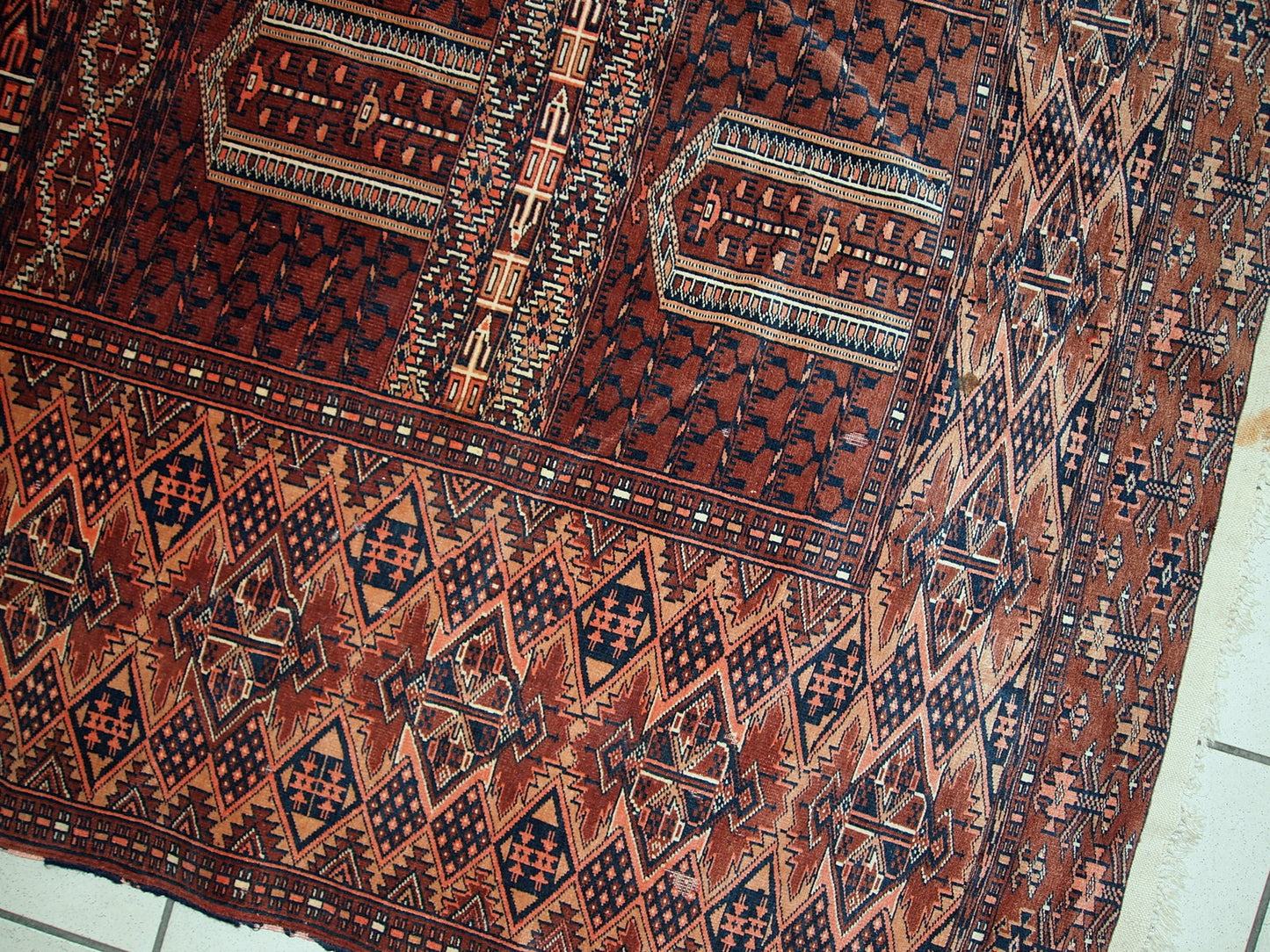 Semi-antique Turkmen Hachli prayer handmade rug in original good condition. The rug has fine weave and it is very thin. The rug is in burgundy, pink, navy blue and white shades.