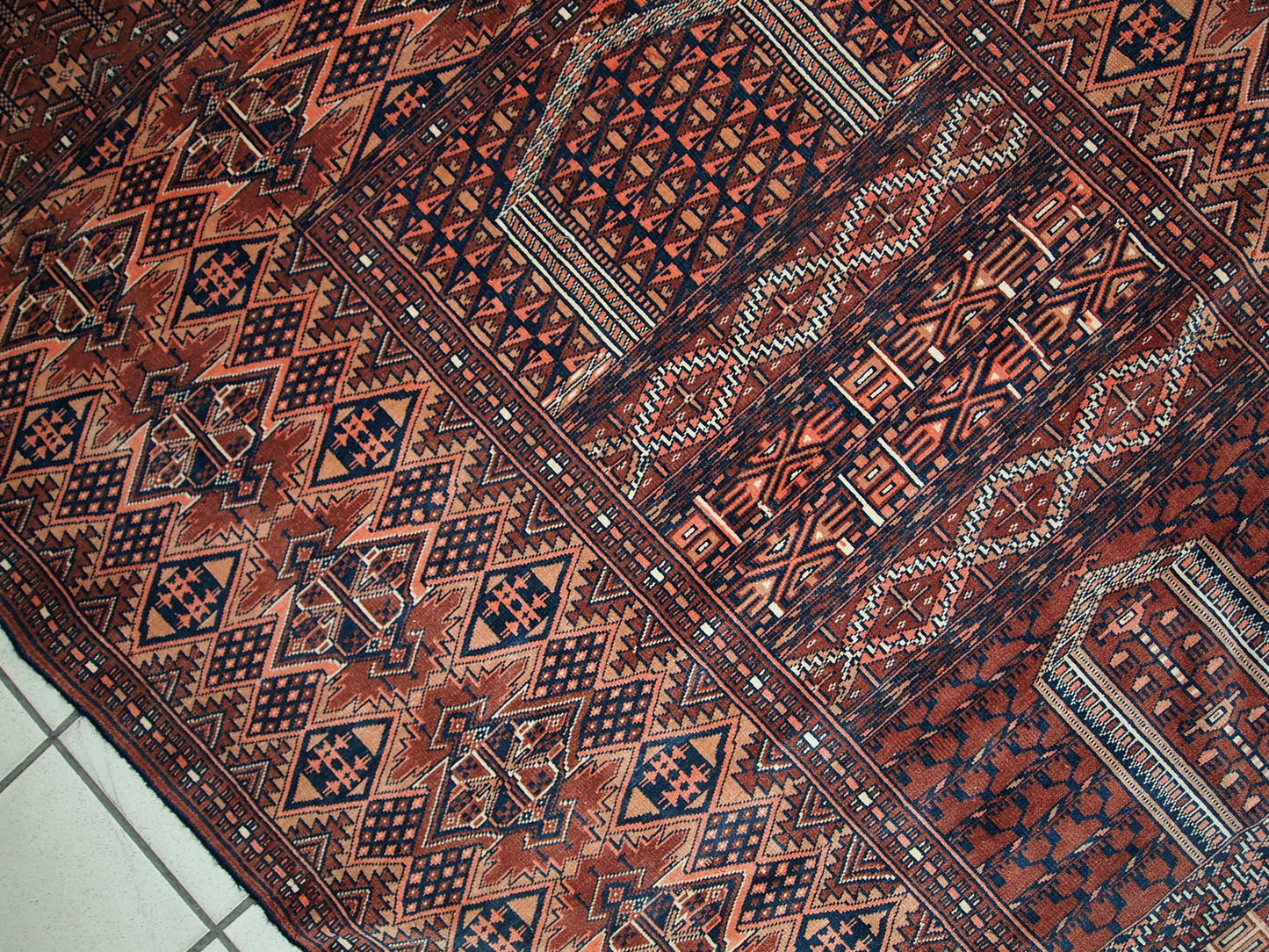 Semi-antique Turkmen Hachli prayer handmade rug in original good condition. The rug has fine weave and it is very thin. The rug is in burgundy, pink, navy blue and white shades.