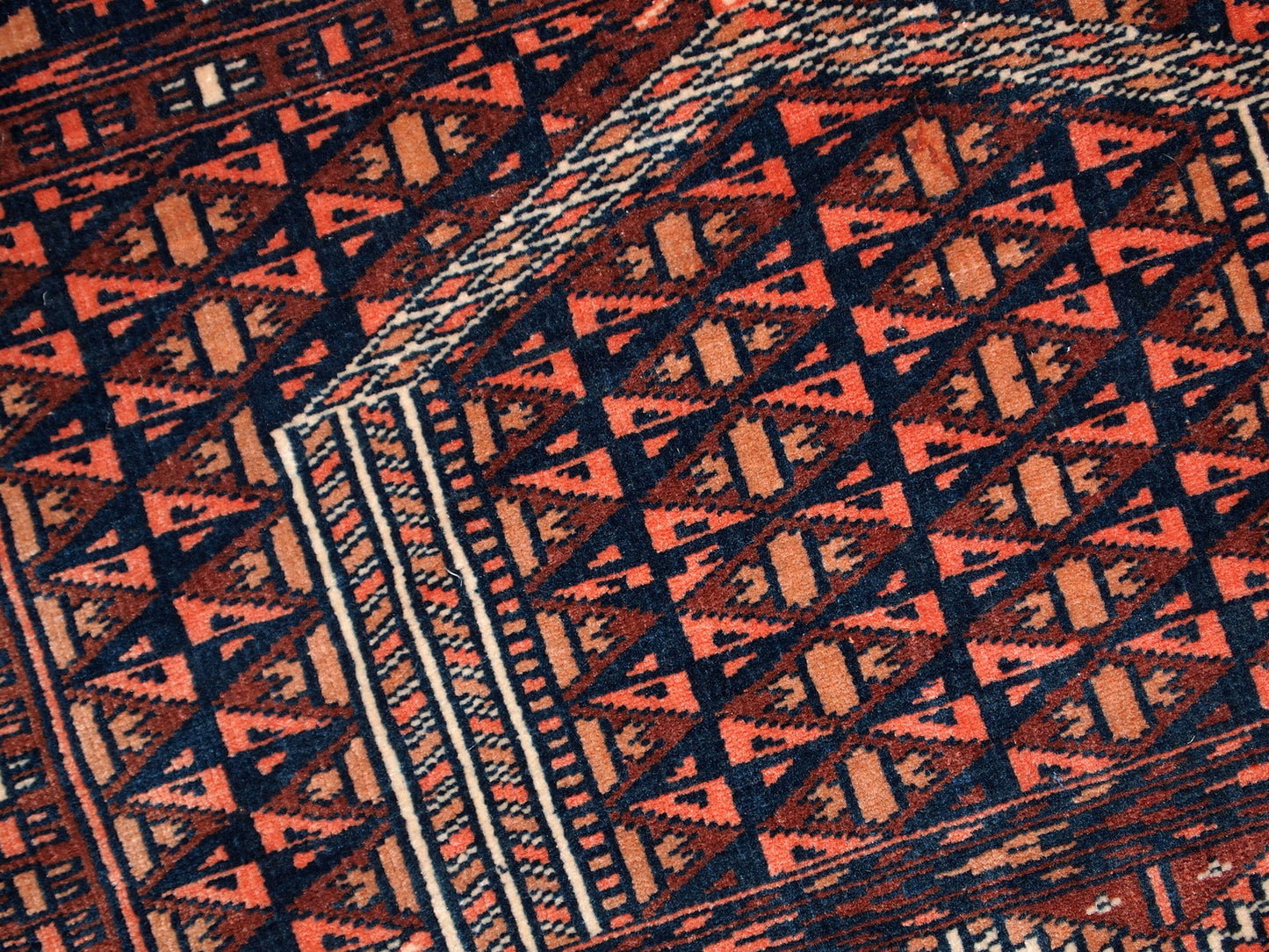 Semi-antique Turkmen Hachli prayer handmade rug in original good condition. The rug has fine weave and it is very thin. The rug is in burgundy, pink, navy blue and white shades.