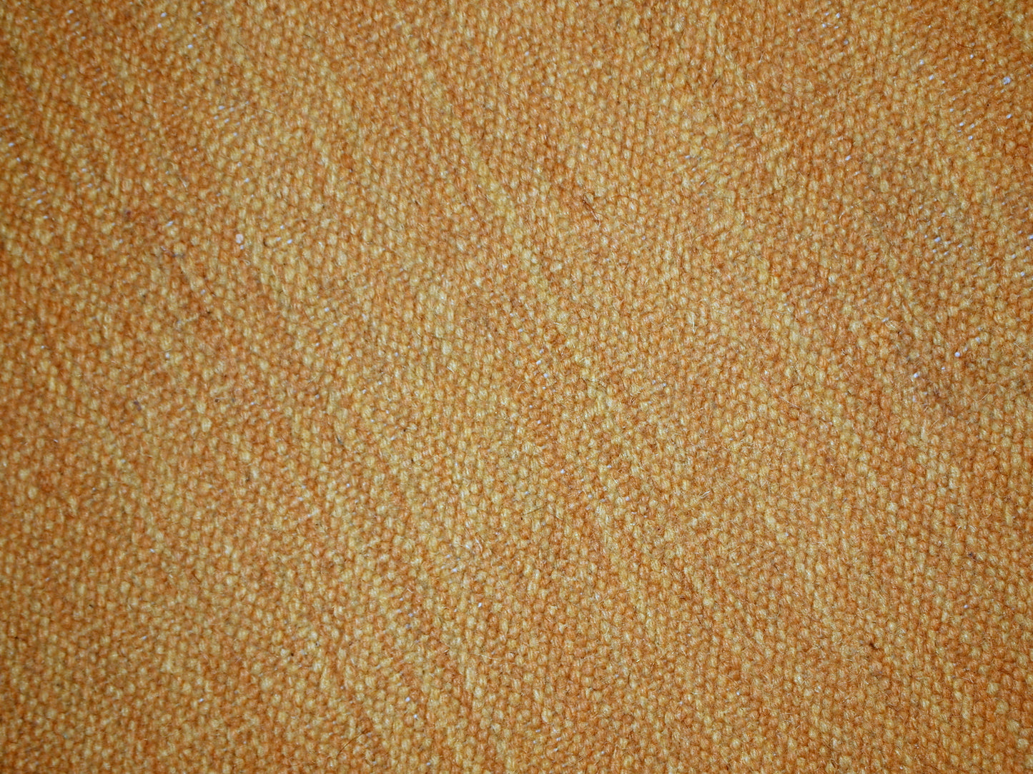 Vintage handmade Persian Gabbeh kilim in original condition. The rug is in yellow shad with minimal abstract design on it. It is made in wool.