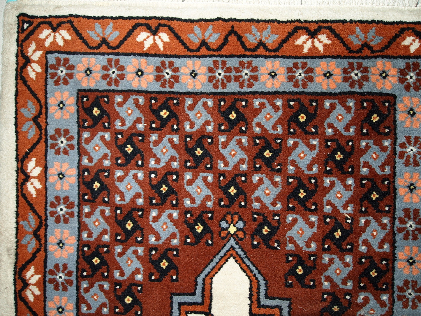 Vintage Berber rug from Morocco in original good condition. The rug made in the end of 20th century in wool.