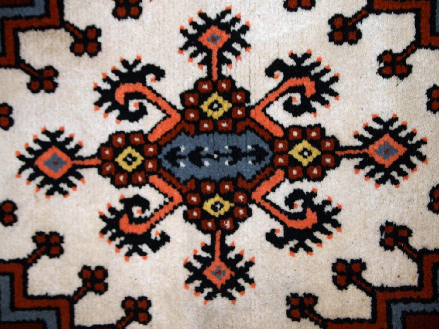 Vintage Berber rug from Morocco in original good condition. The rug made in the end of 20th century in wool.