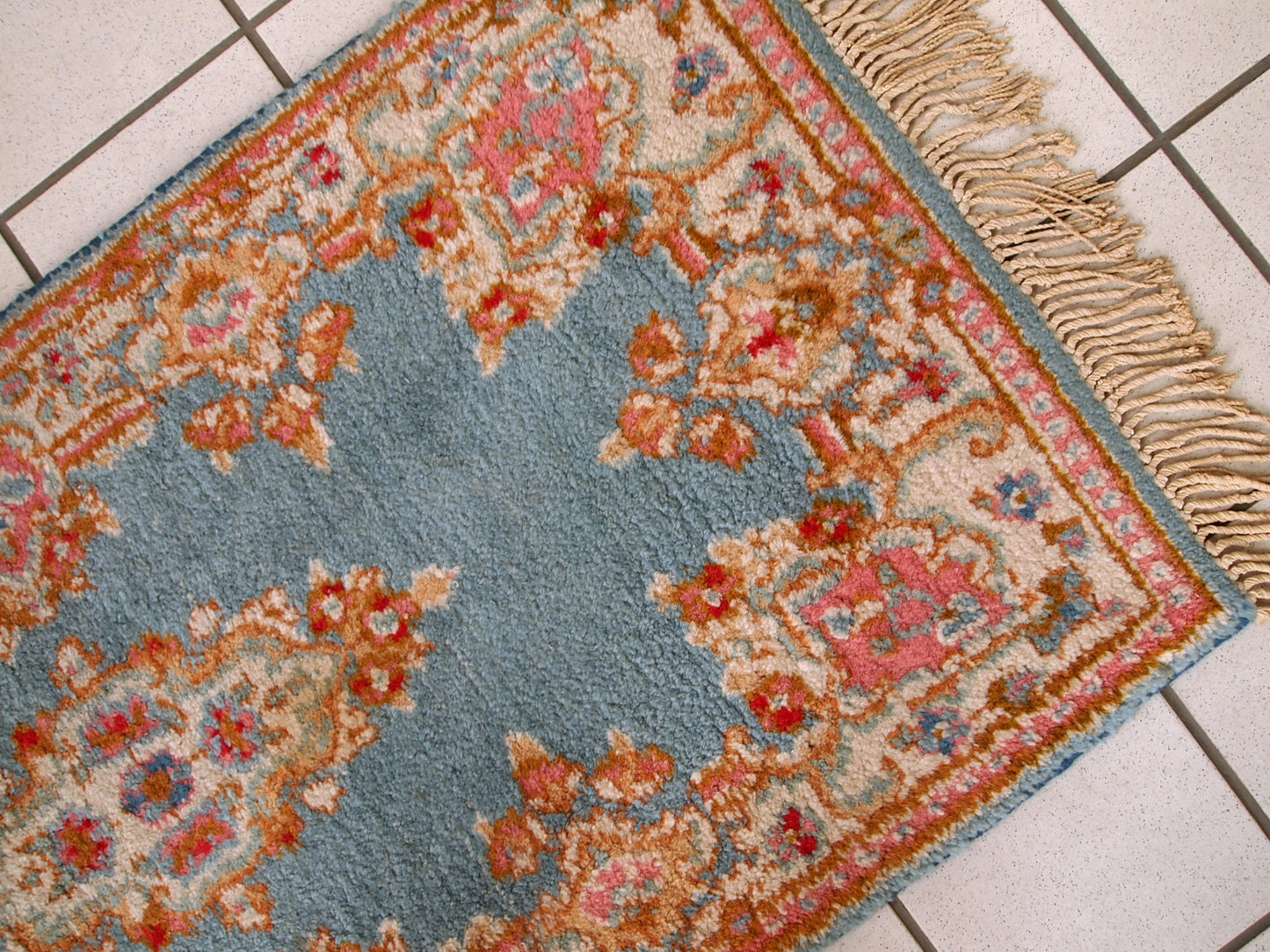Handmade vintage rug from Middle East in sky blue color. It is in original good condition from the end of 20th century.