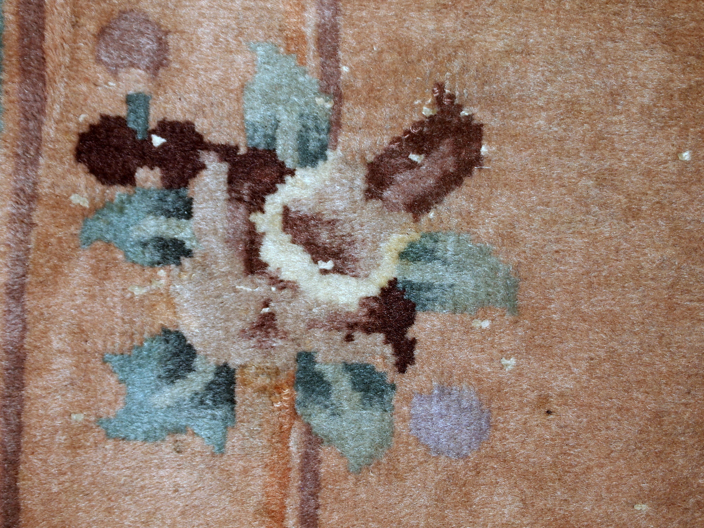 Handmade vintage Art Deco Chinese rug in light brown shade. The rug is from the middle of 20th century in original condition, it has some low pile.