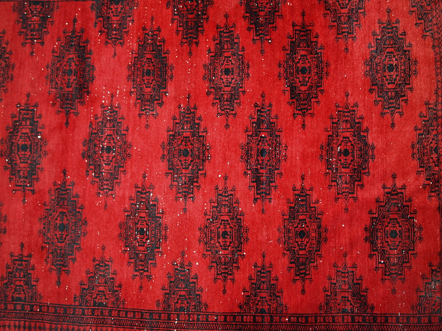 Handmade vintage rug from Afghanistan from the end of 20th century. The rug is in original condition, it has one patch.