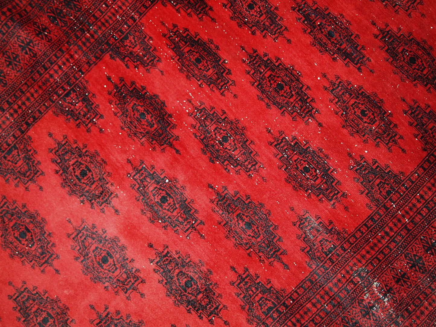 Handmade vintage rug from Afghanistan from the end of 20th century. The rug is in original condition, it has one patch.