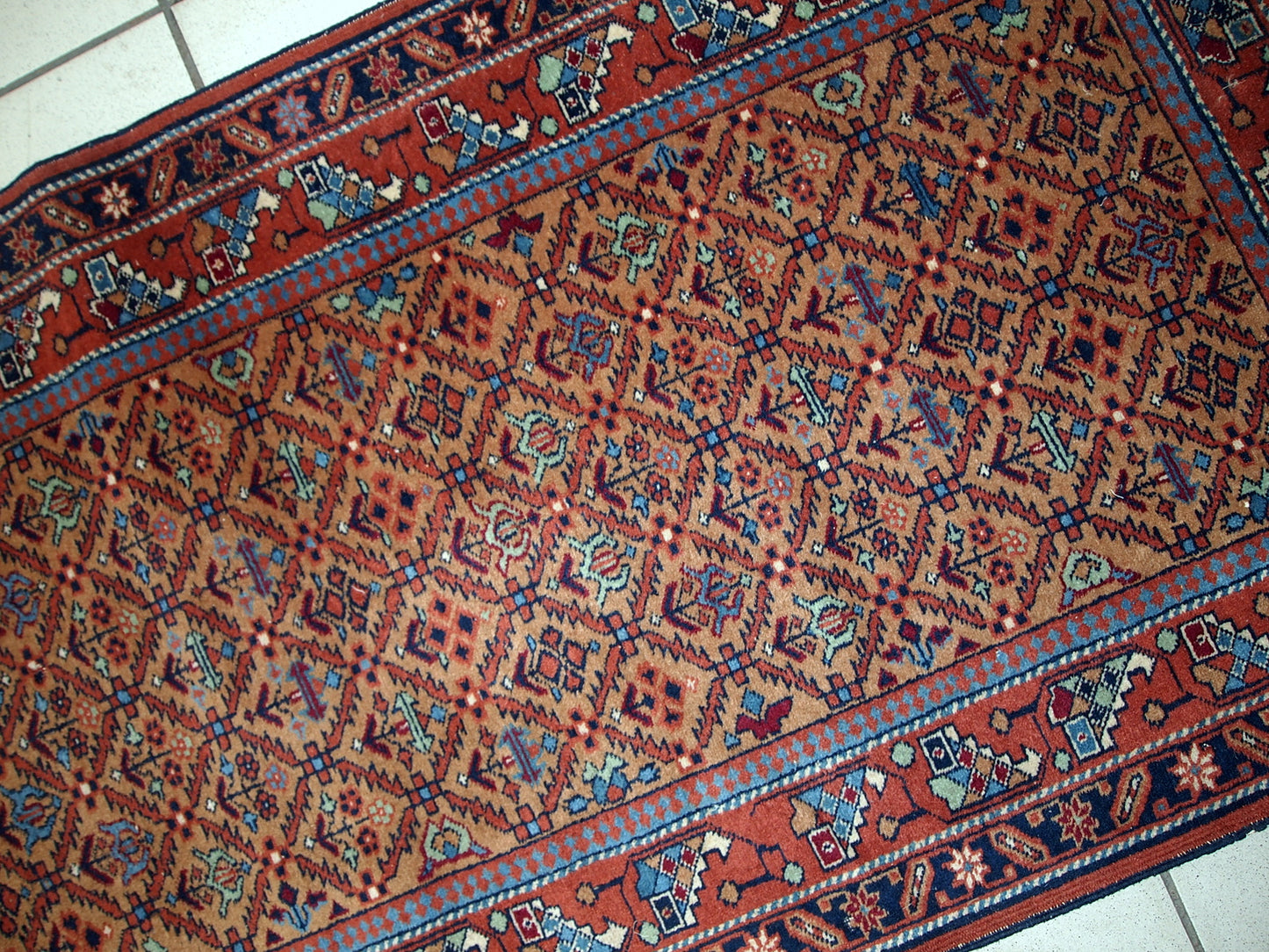 Vintage runner from Middle East in original good condition. It has been made in wool in the middle of 20th century. This runner is machine made.
