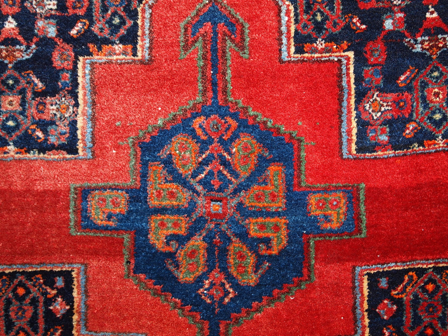 Handmade vintage Persian Senneh rug in original good condition. The rug is from the middle of 20th century, made in wool.
