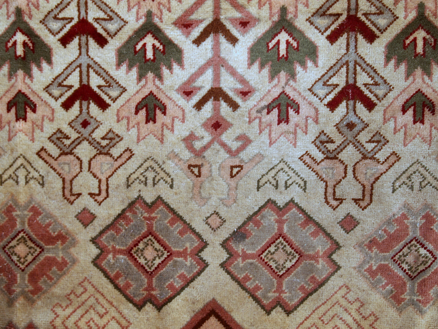 Handmade vintage Turkish Sivas rug in geometric design. The rug is in original condition, from the middle of 20th century. The rug has some age discolorations.