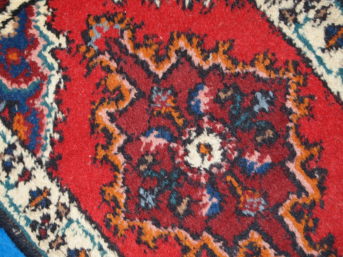 Vintage handmade Middle Eastern mat in original good condition. The rug is from the end of 20th century.