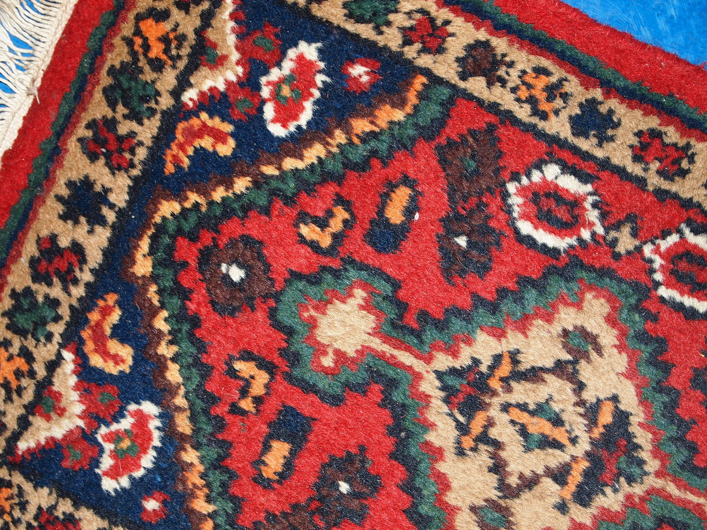 Vintage handmade Middle Eastern mat in original good condition. The rug is from the end of 20th century.