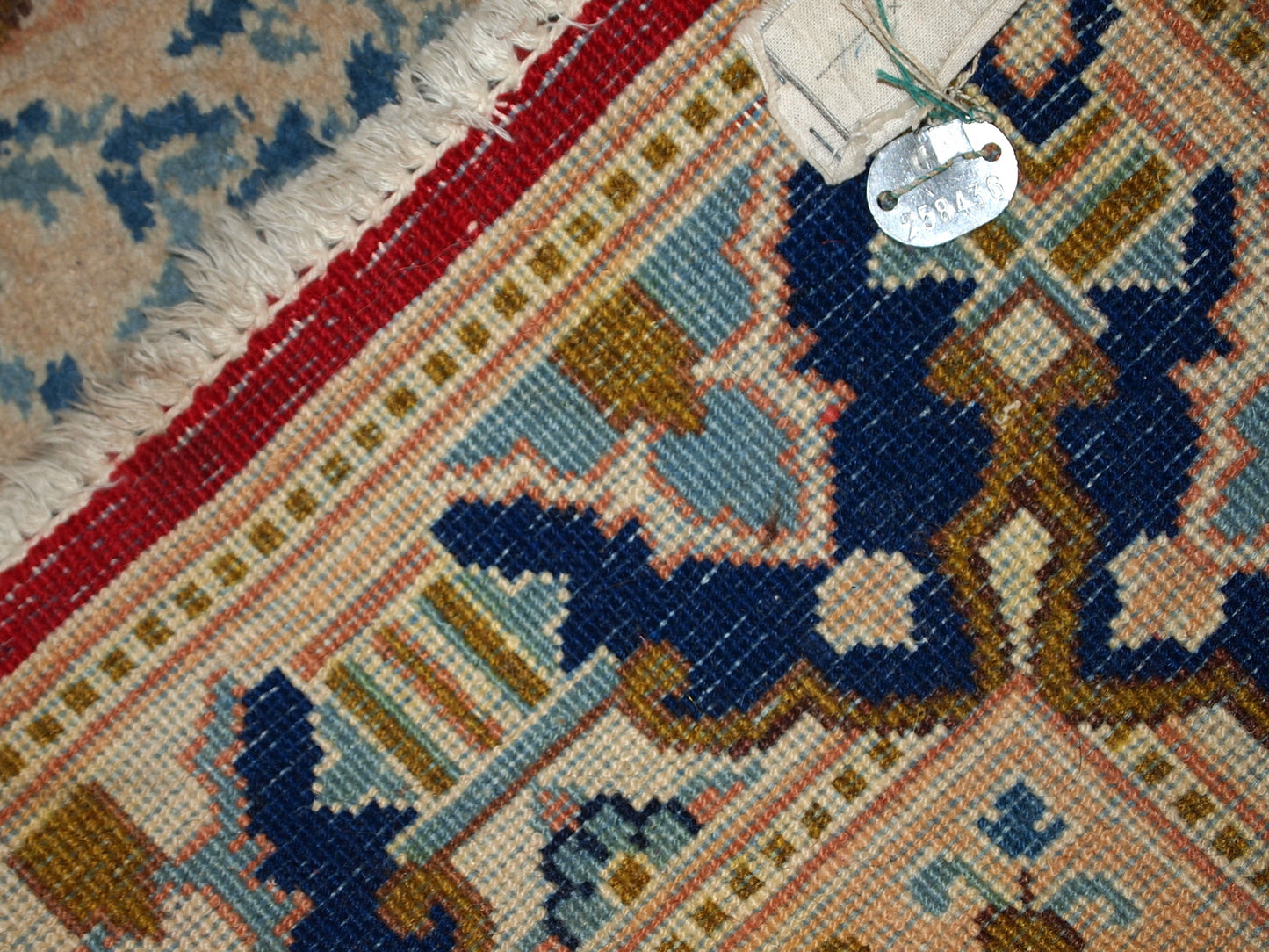 Handmade vintage Middle Eastern rug in traditional design. The rug is from the end of 20th century in original condition, it as some low pile.