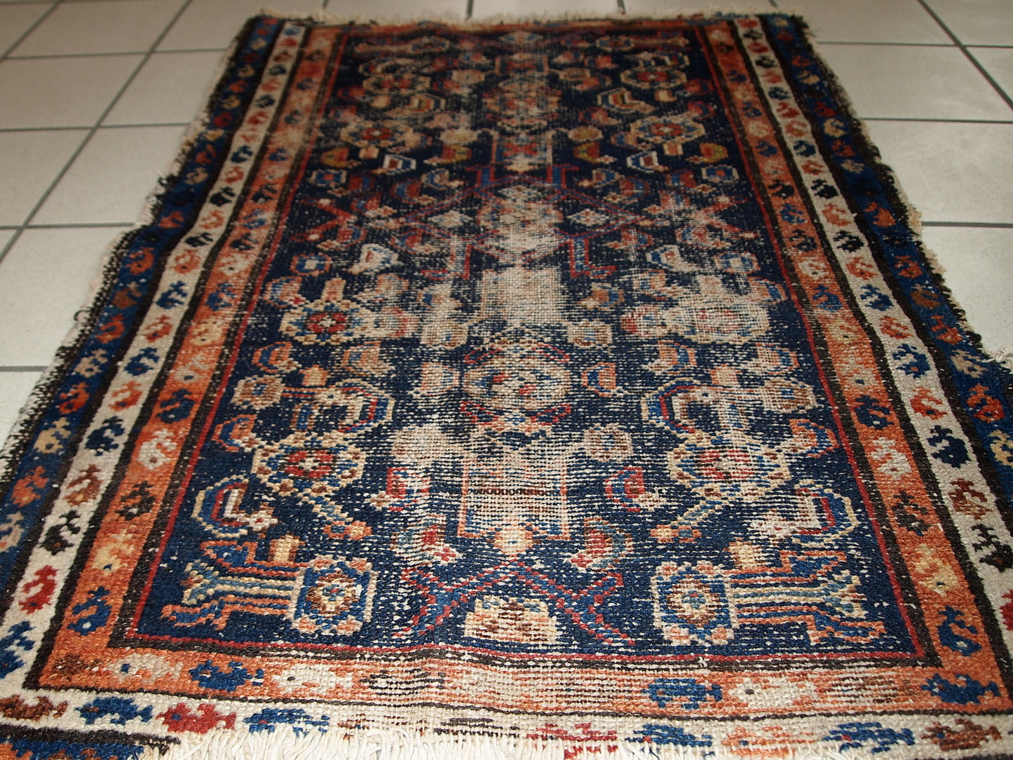 Handmade antique Persian Malayer distressed rug 1900s