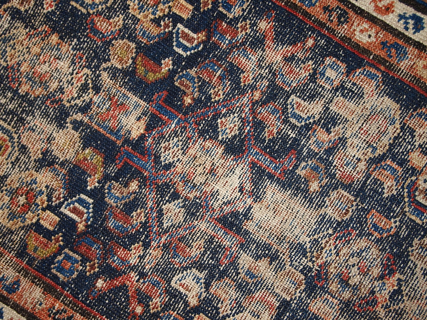 Handmade antique Persian Malayer distressed rug 1900s