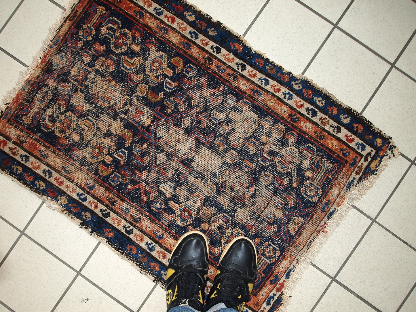 Handmade antique Persian Malayer distressed rug 1900s