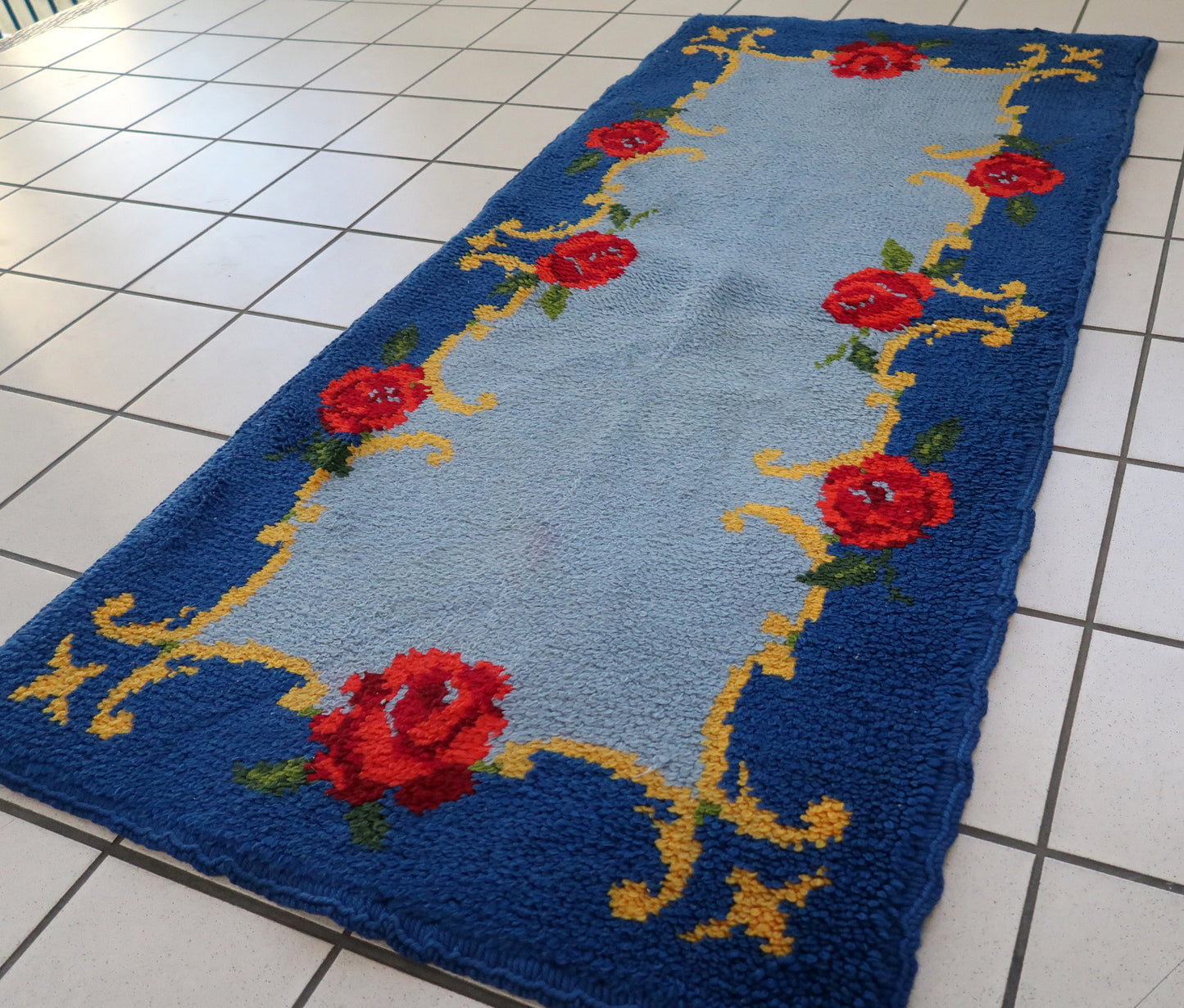 Vintage French Savonnerie rug in sky blue color. The rug has been made in wool in the end of 20th century. It is in original good condition.