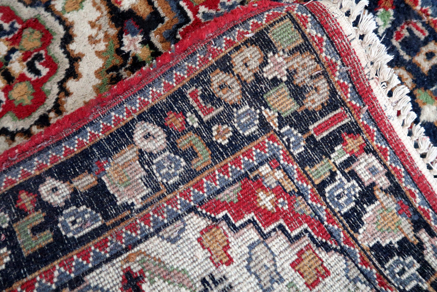 Handmade vintage Persian Malayer runner in red color. The rug has been made in wool in the middle of 20th century. It is in original condition, it has some signs of age.