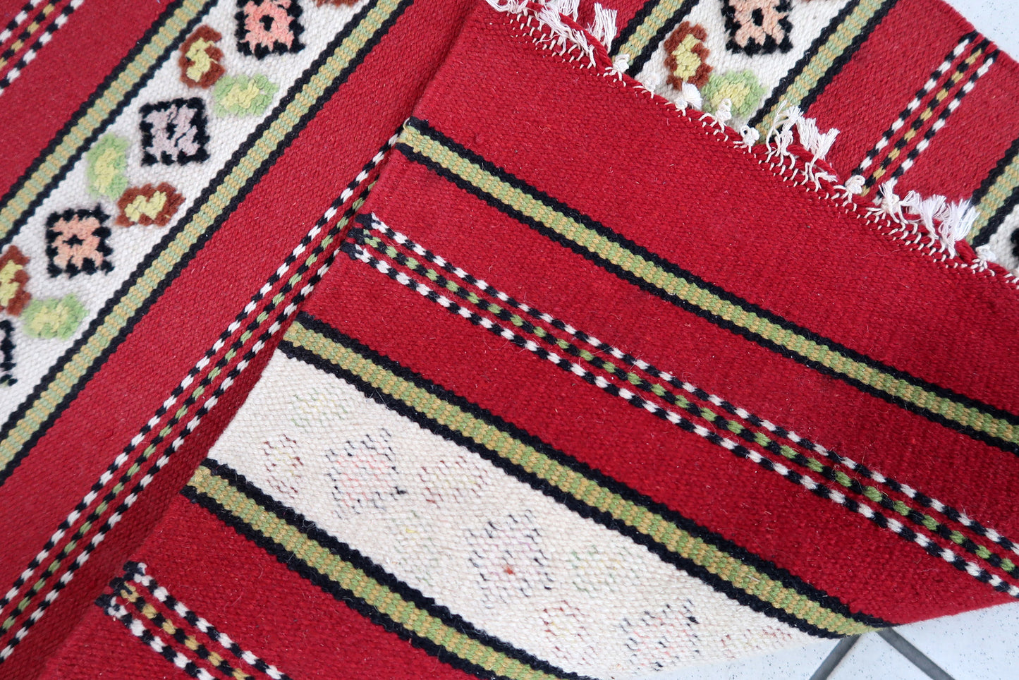 Handmade vintage Persian Ardabil narrow runner in red and white stripes. The rug is from the end of 20th century in original good condition.