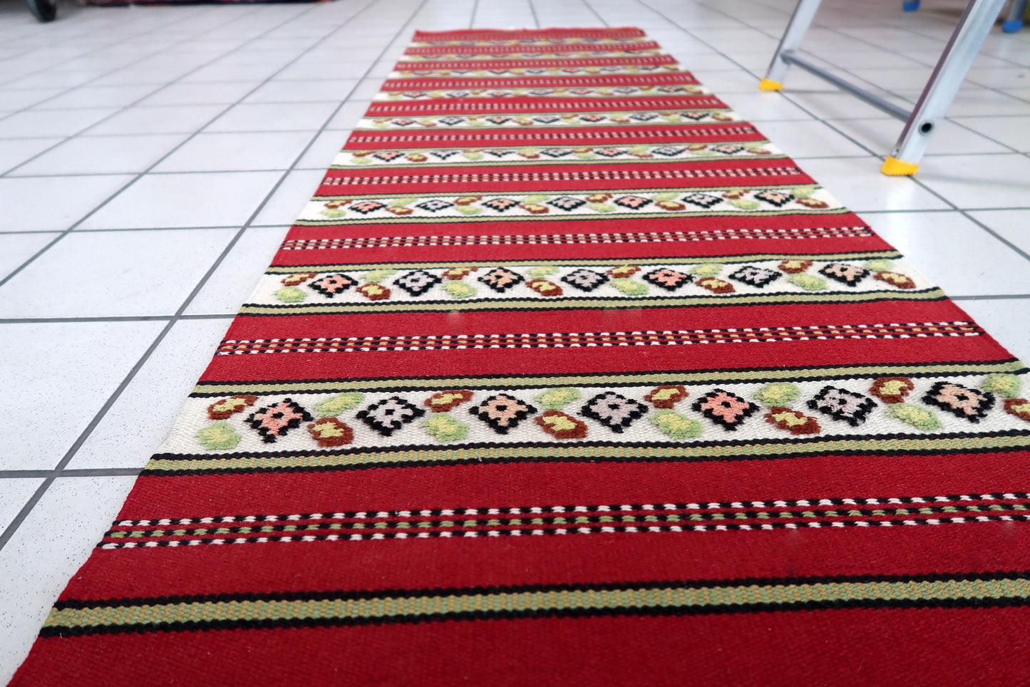 Handmade vintage Persian Ardabil narrow runner in red and white stripes. The rug is from the end of 20th century in original good condition.