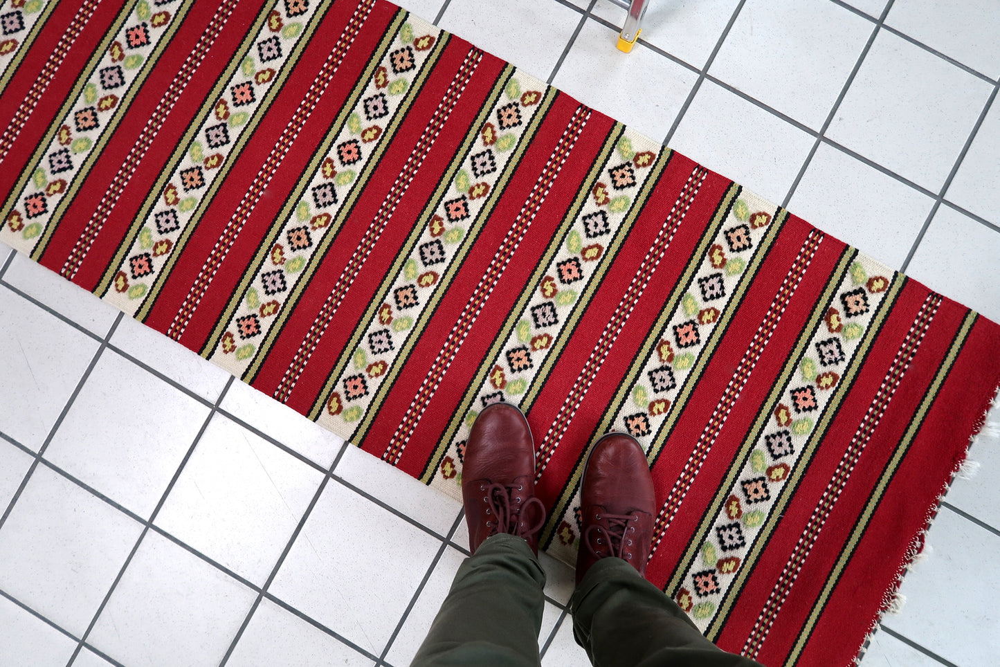 Handmade vintage Persian Ardabil narrow runner in red and white stripes. The rug is from the end of 20th century in original good condition.