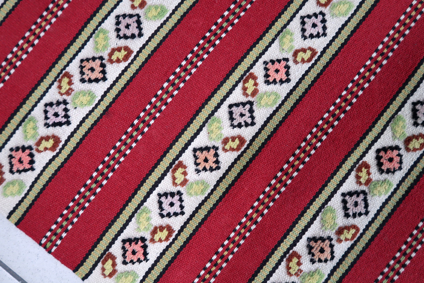 Handmade vintage Persian Ardabil narrow runner in red and white stripes. The rug is from the end of 20th century in original good condition.