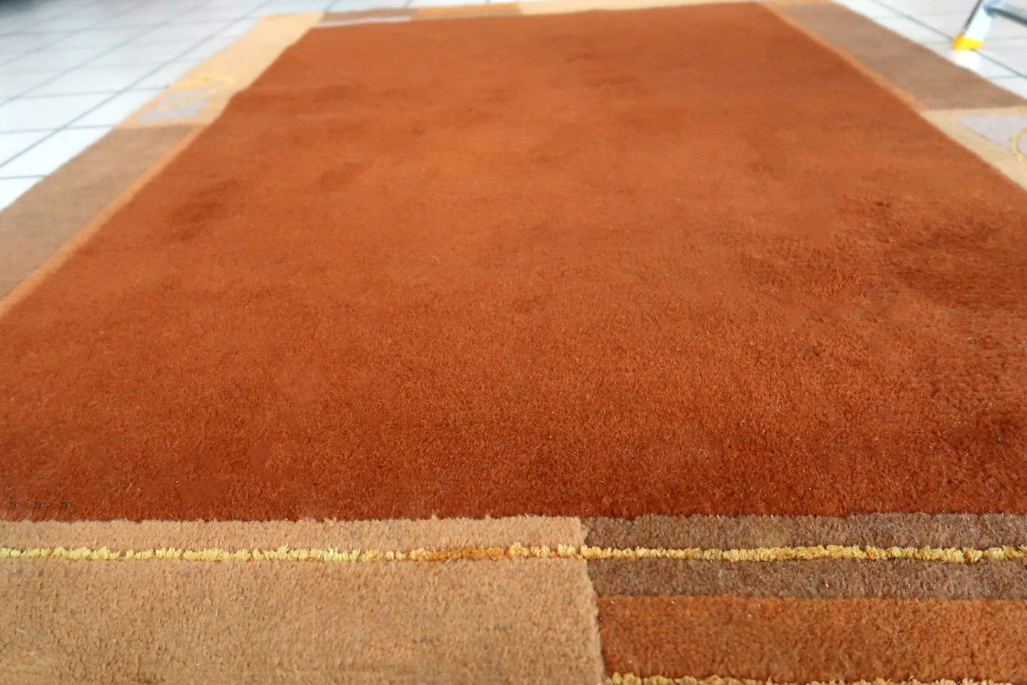 Handmade vintage Tibetan Khaden rug in different shades of brown and beige colors. The rug is from the end of 20th century, it is in original good condition.
