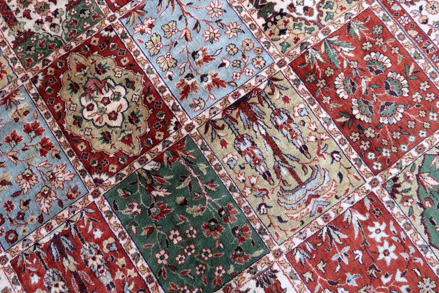 Vintage Indian rug with Qum garden design. This rug is from the end of 20th century in original good condition.