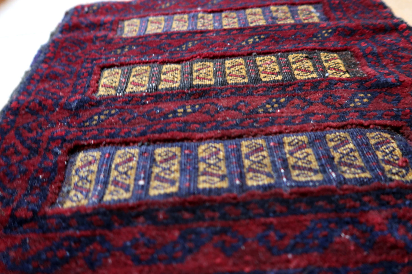 Handmade vintage Afghan Baluch salt bag in deep burgundy color. The bag is from the end of 20th century in original good condition.