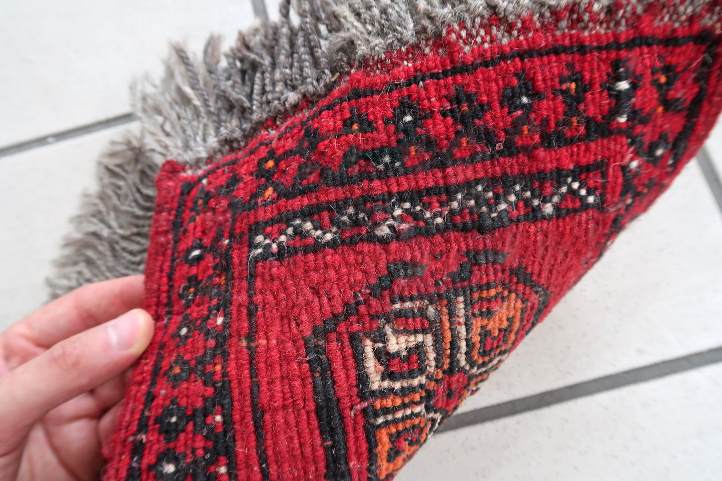 Handmade vintage Afghan Ersari mat in bright red shade. The rug is from the end of 20th century in original good condition. It can be used as a doll house rug.