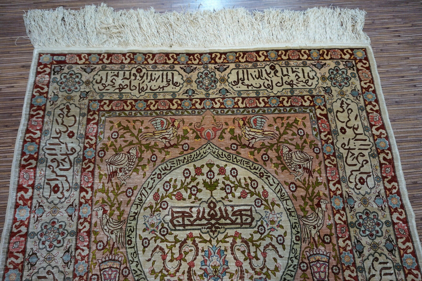 Handmade vintage Turkish Hereke rug made in natural silk and prayer design. The rug is from the middle of 20th century in original good condition.