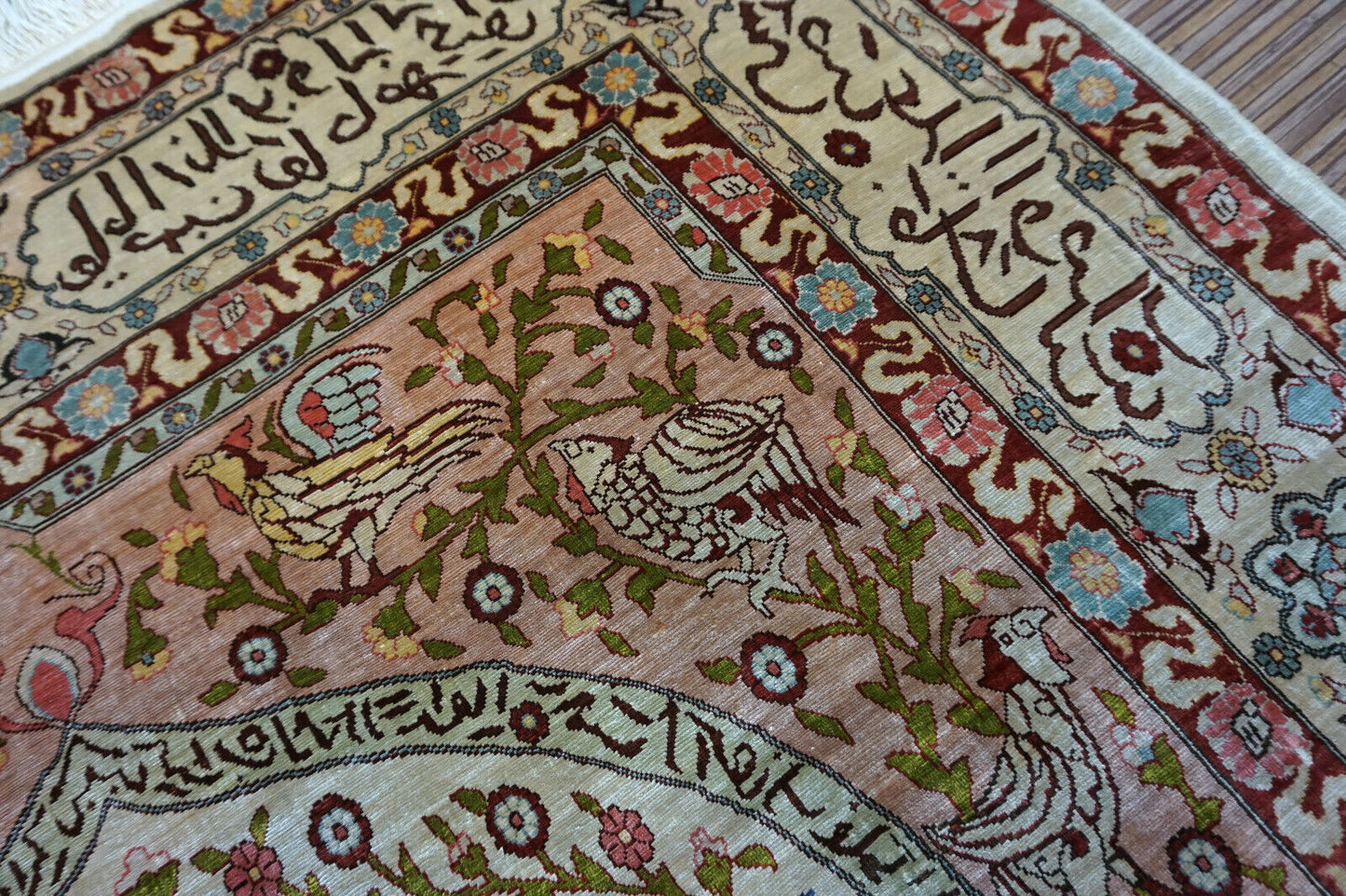 Handmade vintage Turkish Hereke rug made in natural silk and prayer design. The rug is from the middle of 20th century in original good condition.