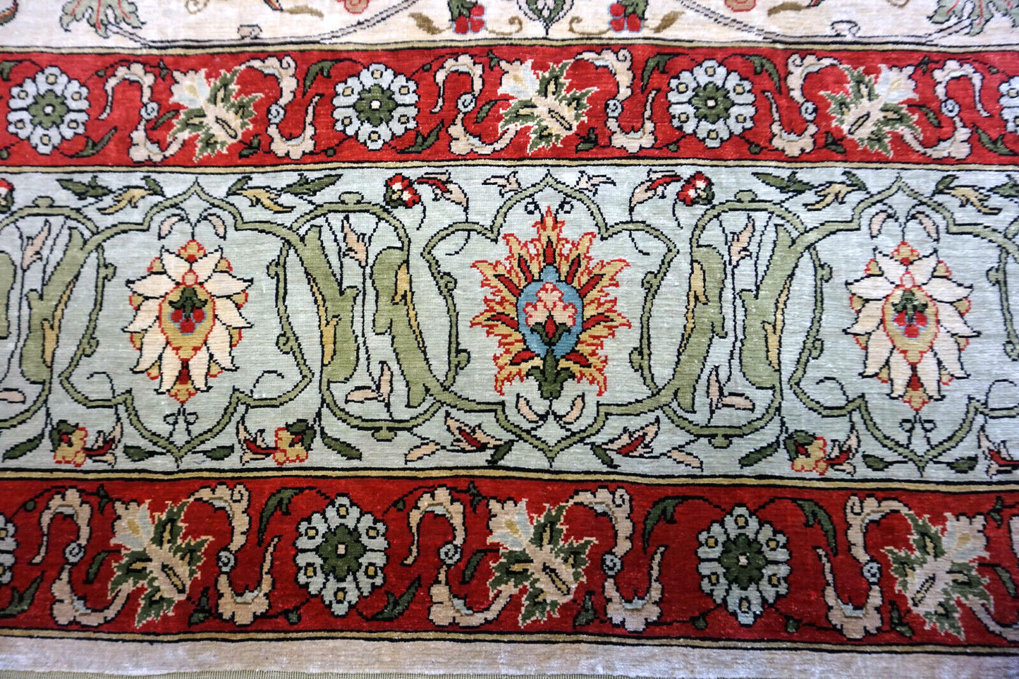 Handmade vintage Turkish Hereke rug made in natural silk and prayer design. The rug is from the middle of 20th century in original good condition.