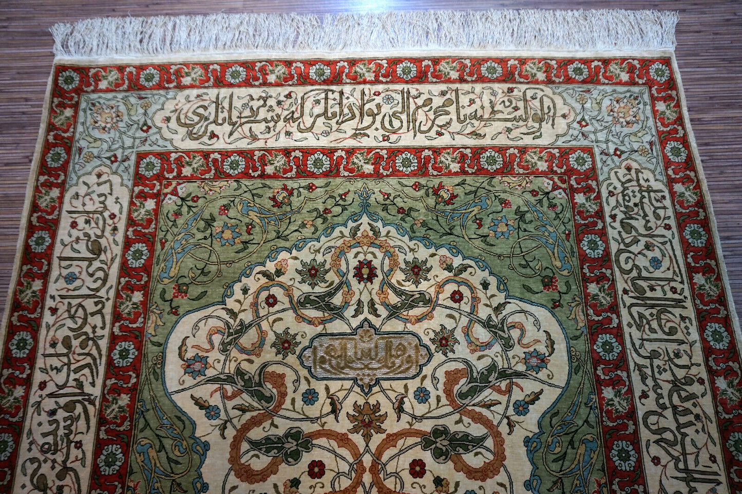 Handmade vintage Turkish Hereke rug made in natural silk and prayer design. The rug is from the middle of 20th century in original good condition.