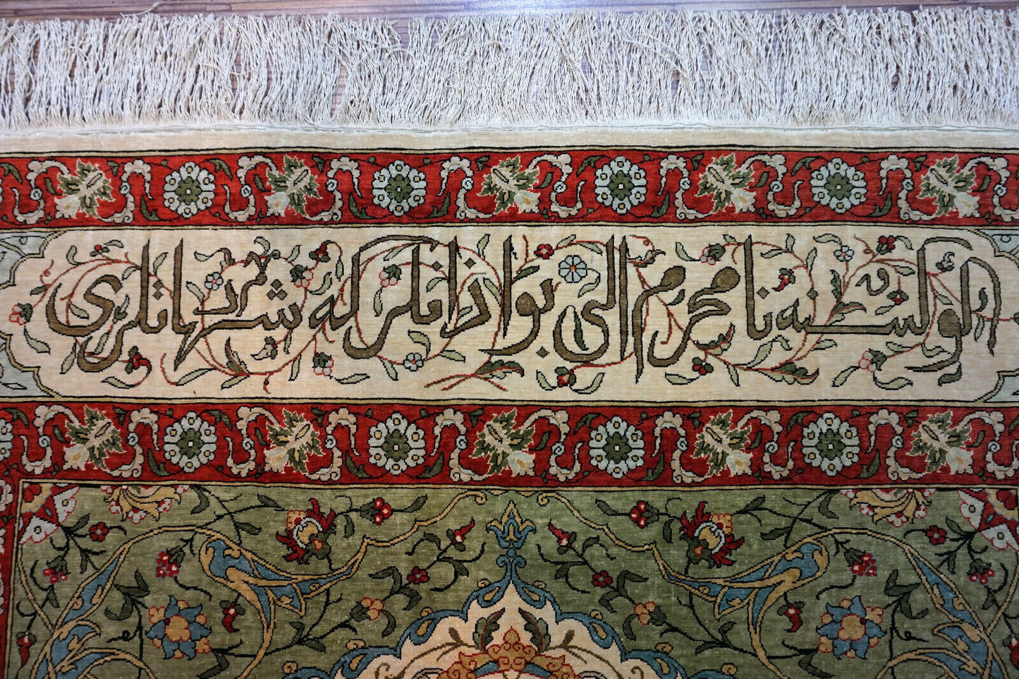 Handmade vintage Turkish Hereke rug made in natural silk and prayer design. The rug is from the middle of 20th century in original good condition.