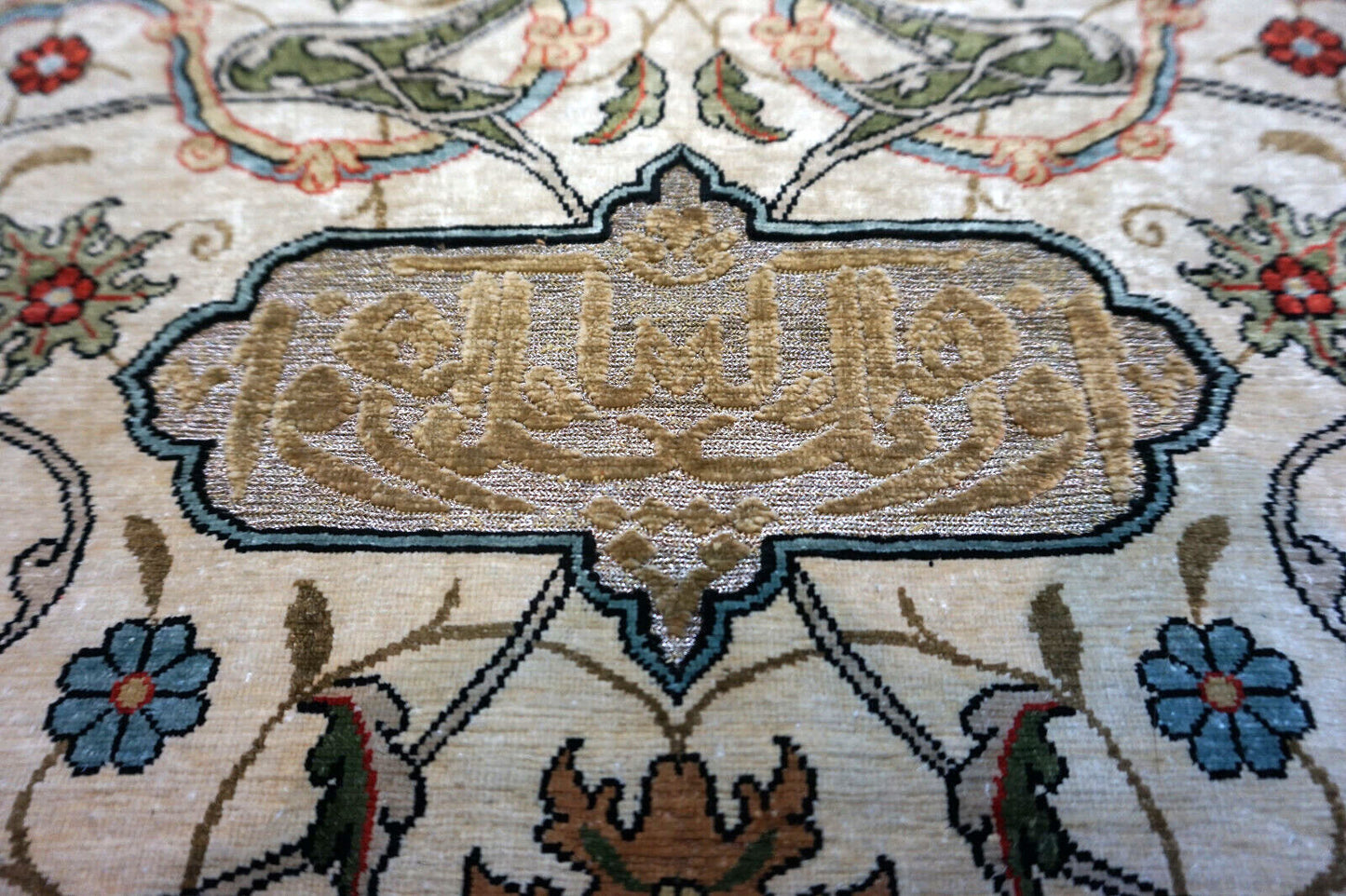 Handmade vintage Turkish Hereke rug made in natural silk and prayer design. The rug is from the middle of 20th century in original good condition.