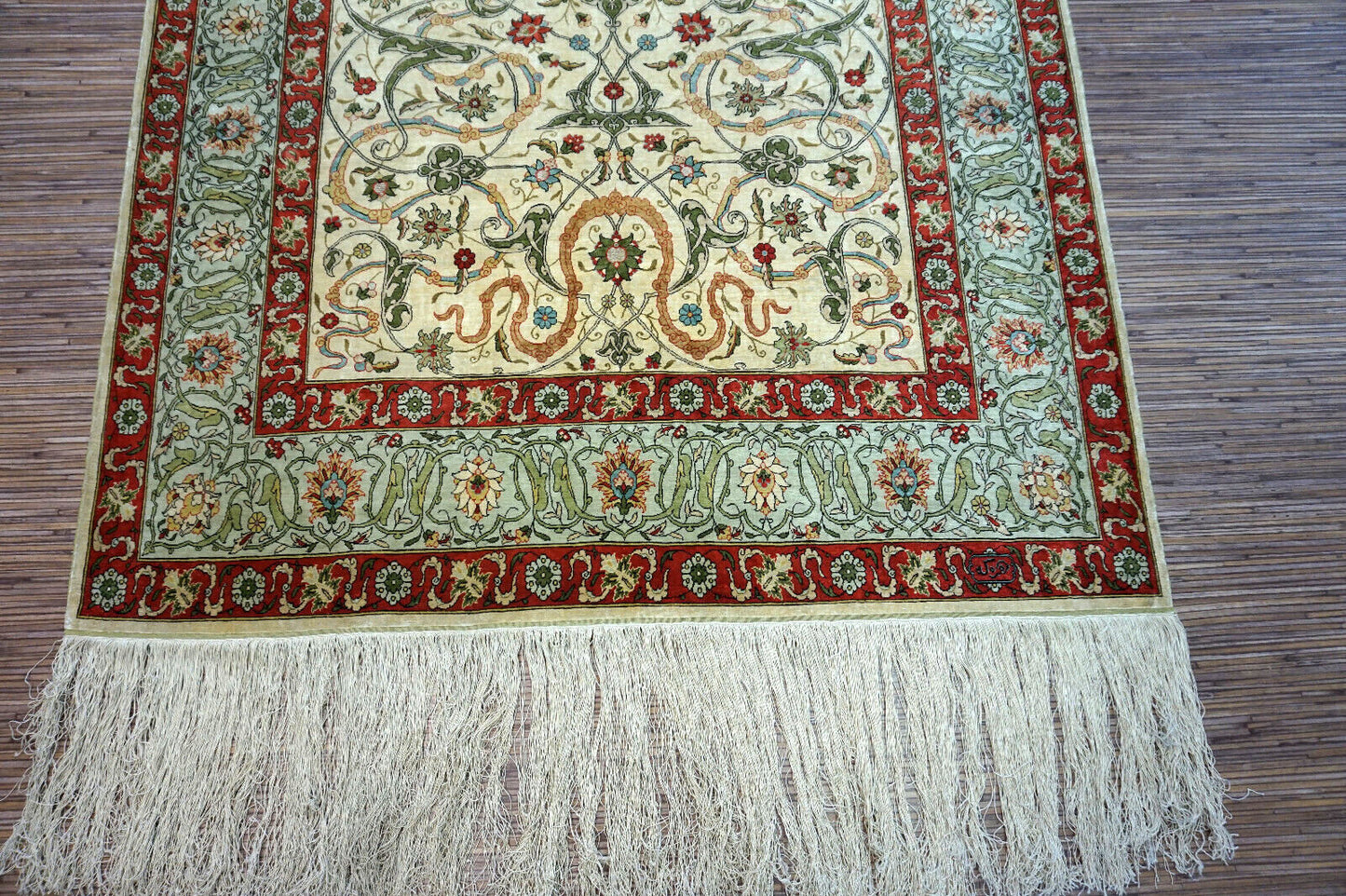 Handmade vintage Turkish Hereke rug made in natural silk and prayer design. The rug is from the middle of 20th century in original good condition.