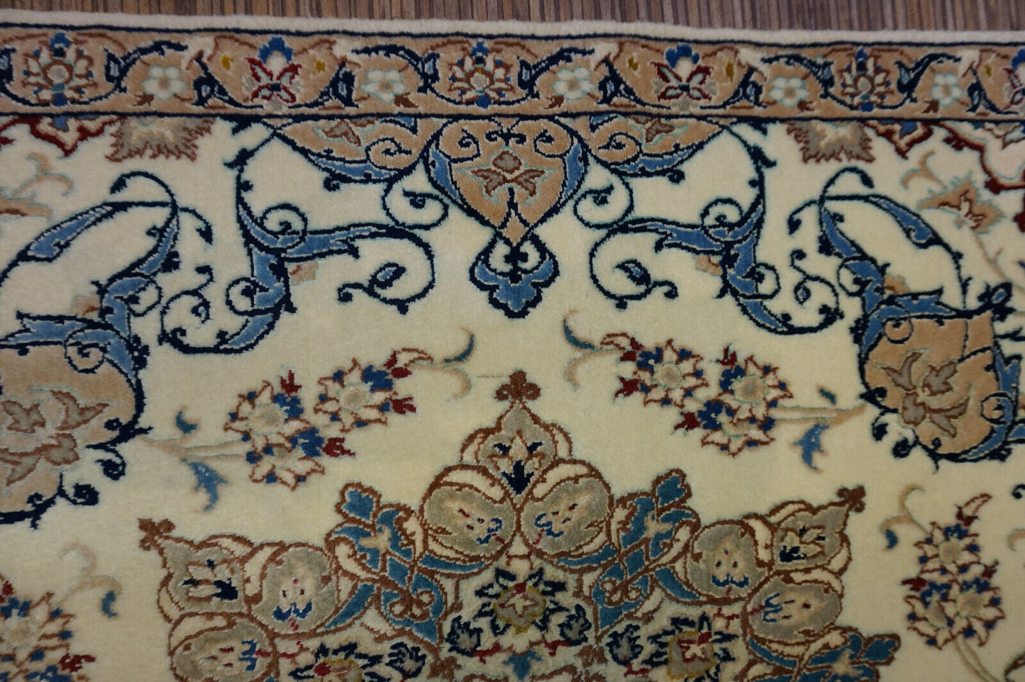 Handmade vintage Persian Nain rug in classic design and beige and blue shades. The rug is from the end of 20th century in original good condition.