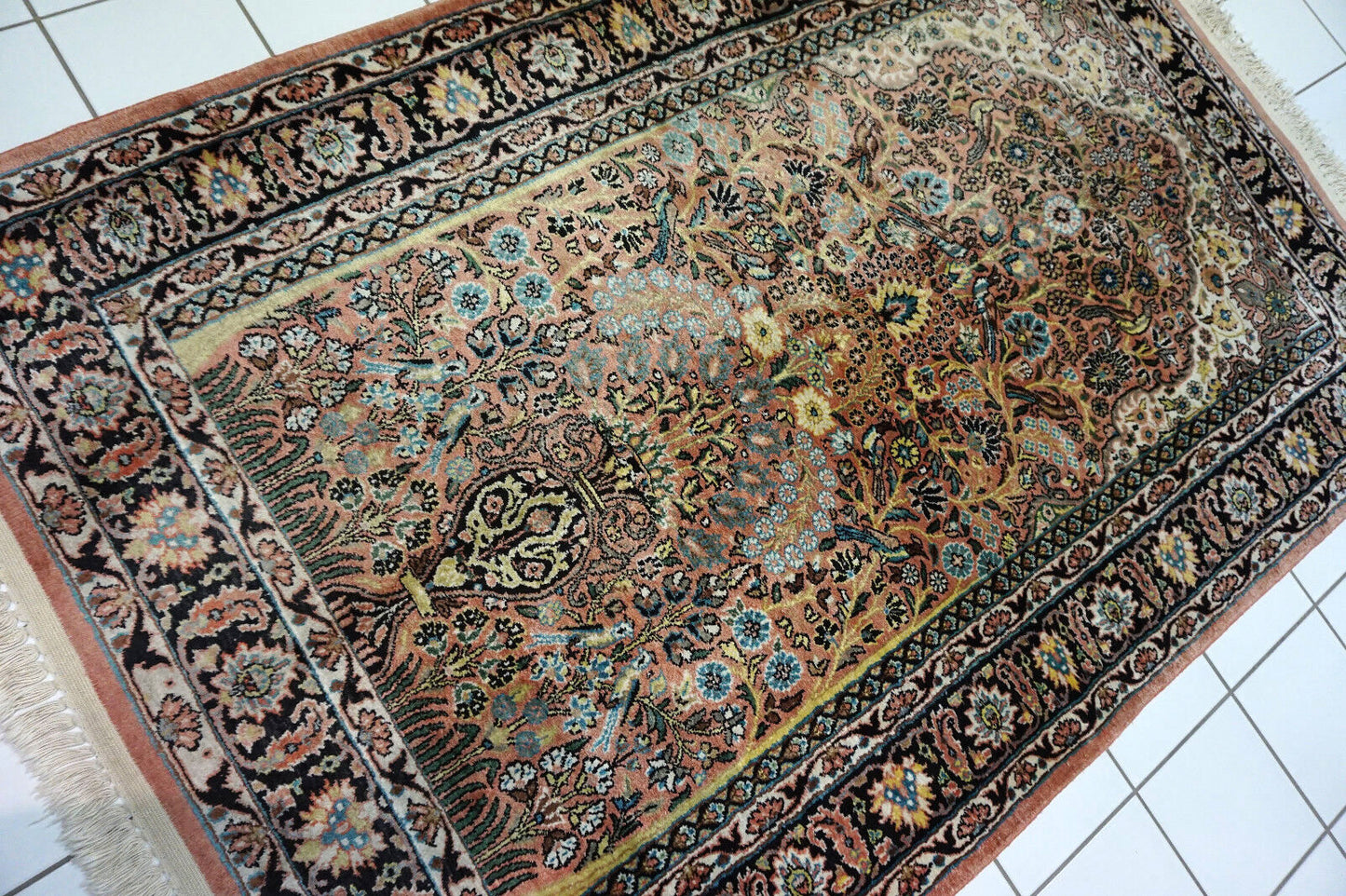 Close-up of Handmade Indian Kashmiri Silk Rug's intricate prayer design