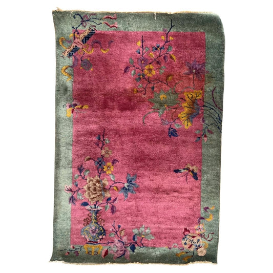 1920s Chinese Art Deco wool rug featuring pink and green floral motifs